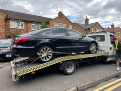 Vehicle being removed from the street