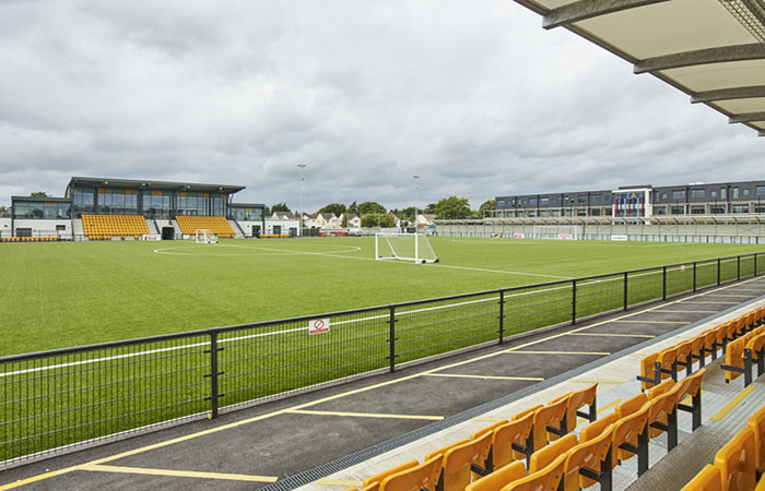 Stadium seating and pitch at Arbour Park