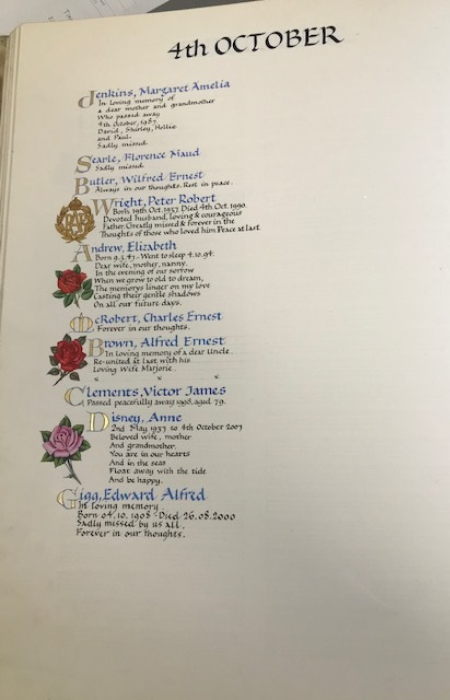Book of remembrance blue and gold writing