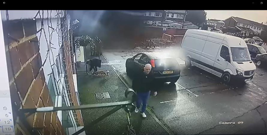 Man who has just dumped his dogs in The Shamrocks pub in Slough walking away from them.