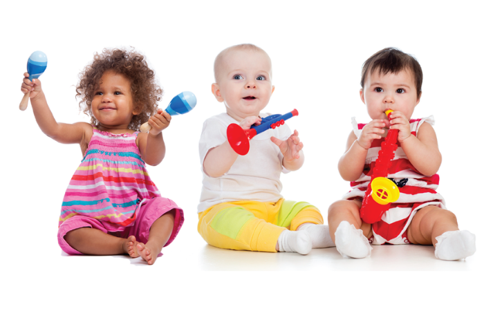 3 babies or toddlers playing instruments