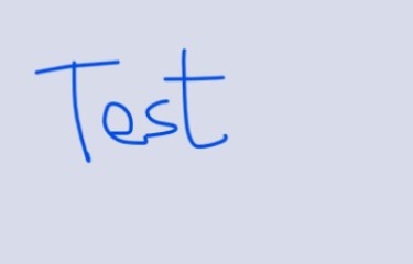 The word 'Test' hand written in blue.