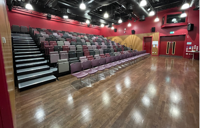Photo of The Venue room at The Curve, Slough showing the raked seating, which can also be folded away